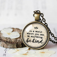 Load image into Gallery viewer, In a World Where You Can Be Anything, Be Kind Pendant, Kindness Jewelry, Mental Health, Mindfulness, Wellness, Be kind and have courage Gift
